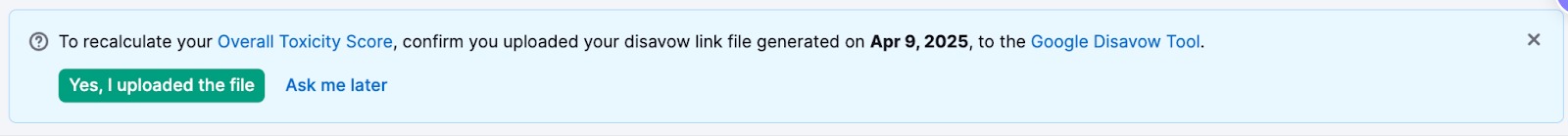 Backlink Audit tool notification prompting confirmation that the disavow file has been uploaded to Google.